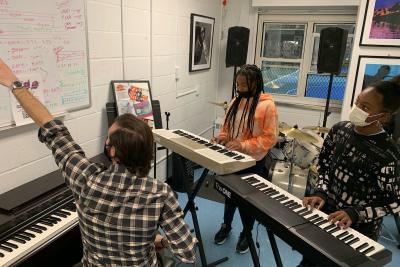 Students learning piano